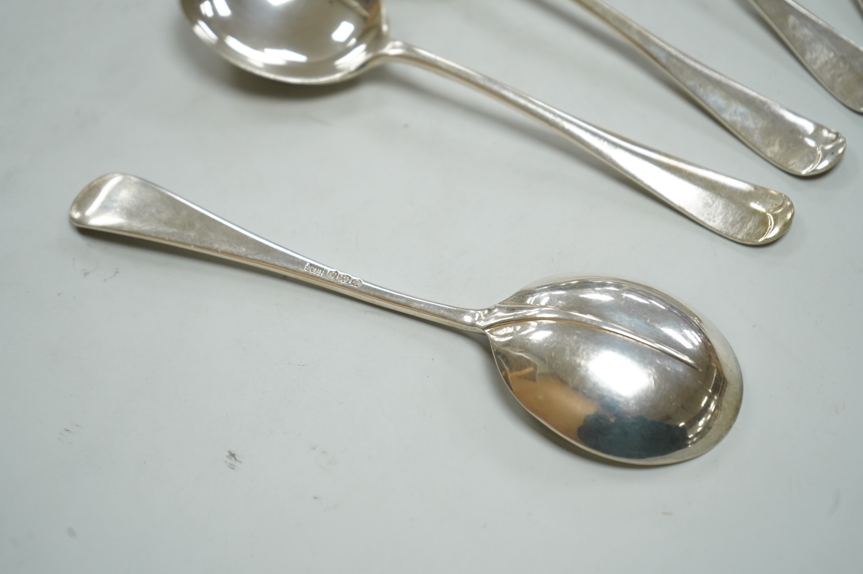 A set of five George V silver Hanoverian rat tail patter soup spoons, Walker & Hall, Sheffield, 1935, 17.9cm, 10.6oz.